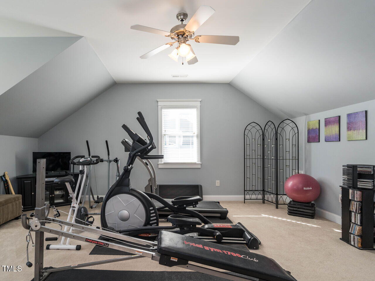 114 Naperville Drive Cary, NC 27519 - Photo 29 of 36 a room with gym equipment