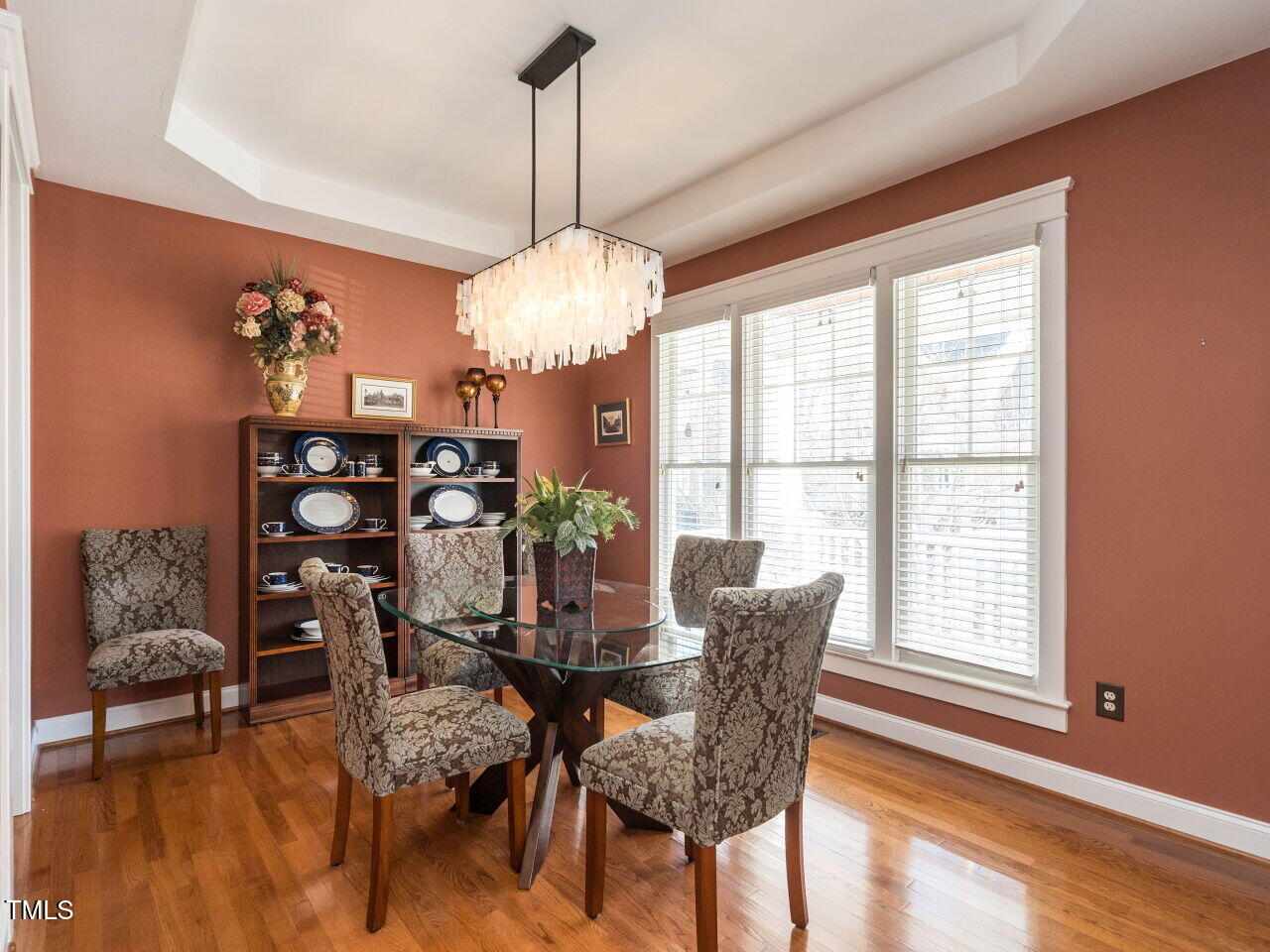 114 Naperville Drive Cary, NC 27519 - Photo 7 of 36 a view of a dining room with furniture window and wooden floor