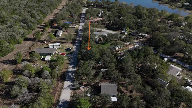 a big yard with lots of green space and trees