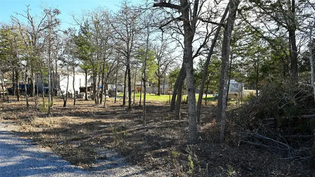 a view of a yard covered with snow
