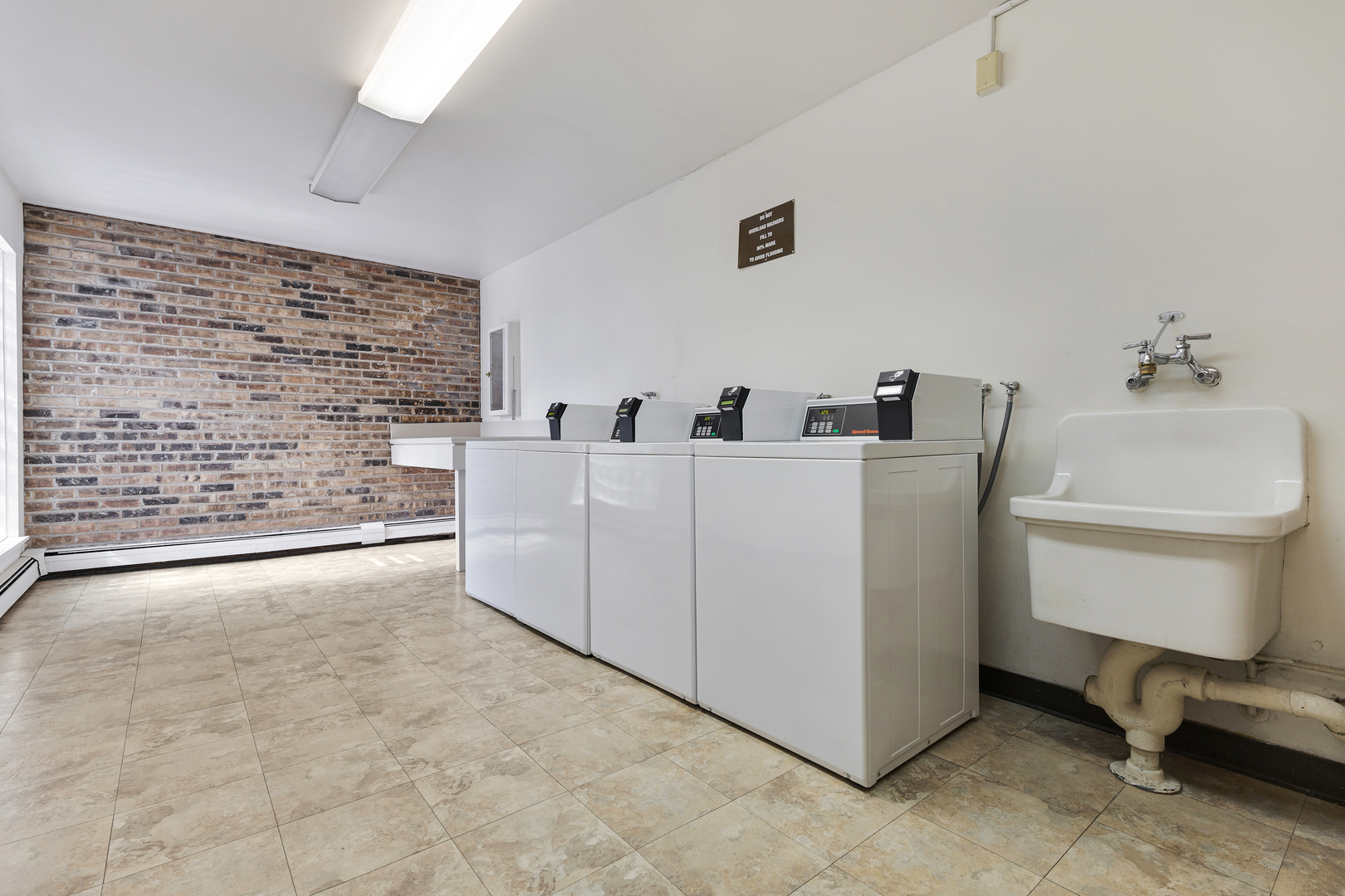 1912 Prairie Square, Unit 209A Schaumburg, IL 60173 - Photo 19 of 26 a view of washer and dryer