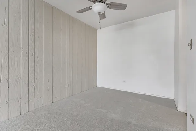 a white stove top oven sitting inside of a kitchen