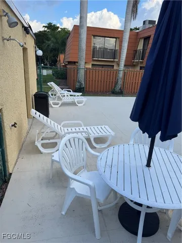 front view of a house with a swimming pool