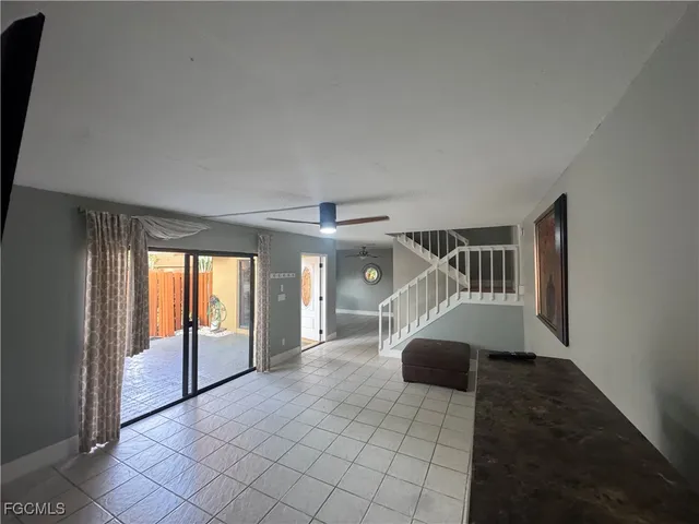 a view of livingroom with furniture and windows