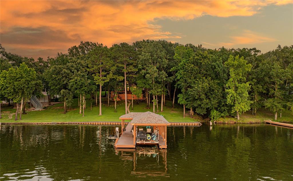 830 Private Road Leesburg, TX 75451 - Photo 1 of 1 Dock with a water view and boat lift