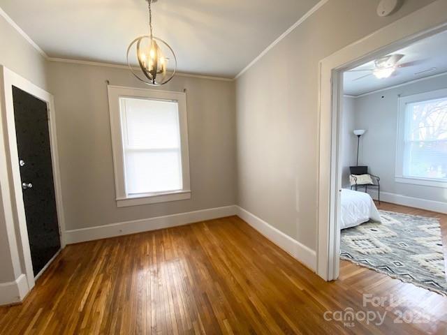 823 Central Avenue, Unit 1 Charlotte, NC 28204 - Photo 2 of 17 wooden floor in an empty room with a window