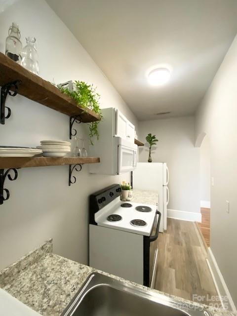 823 Central Avenue, Unit 1 Charlotte, NC 28204 - Photo 7 of 17 a utility room with dryer and washer
