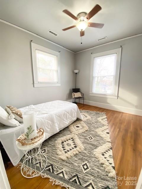 823 Central Avenue, Unit 1 Charlotte, NC 28204 - Photo 9 of 17 a bedroom with a large bed and a window