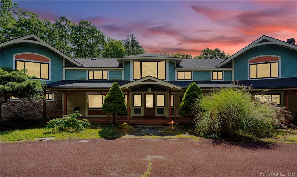 129 Morgan Road Canton, CT 06019 - Photo 1 of 1 a front view of a house with garden
