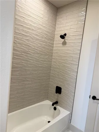 a bathroom with a bathtub