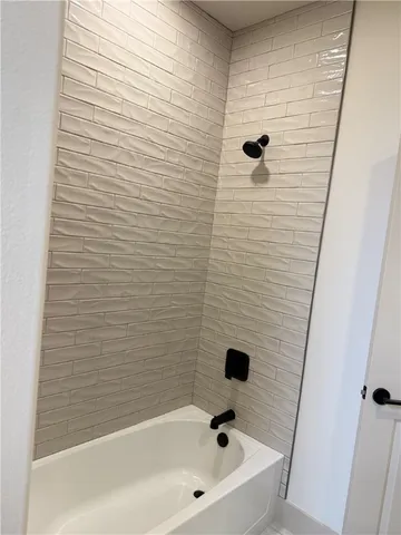 a bathroom with a bathtub