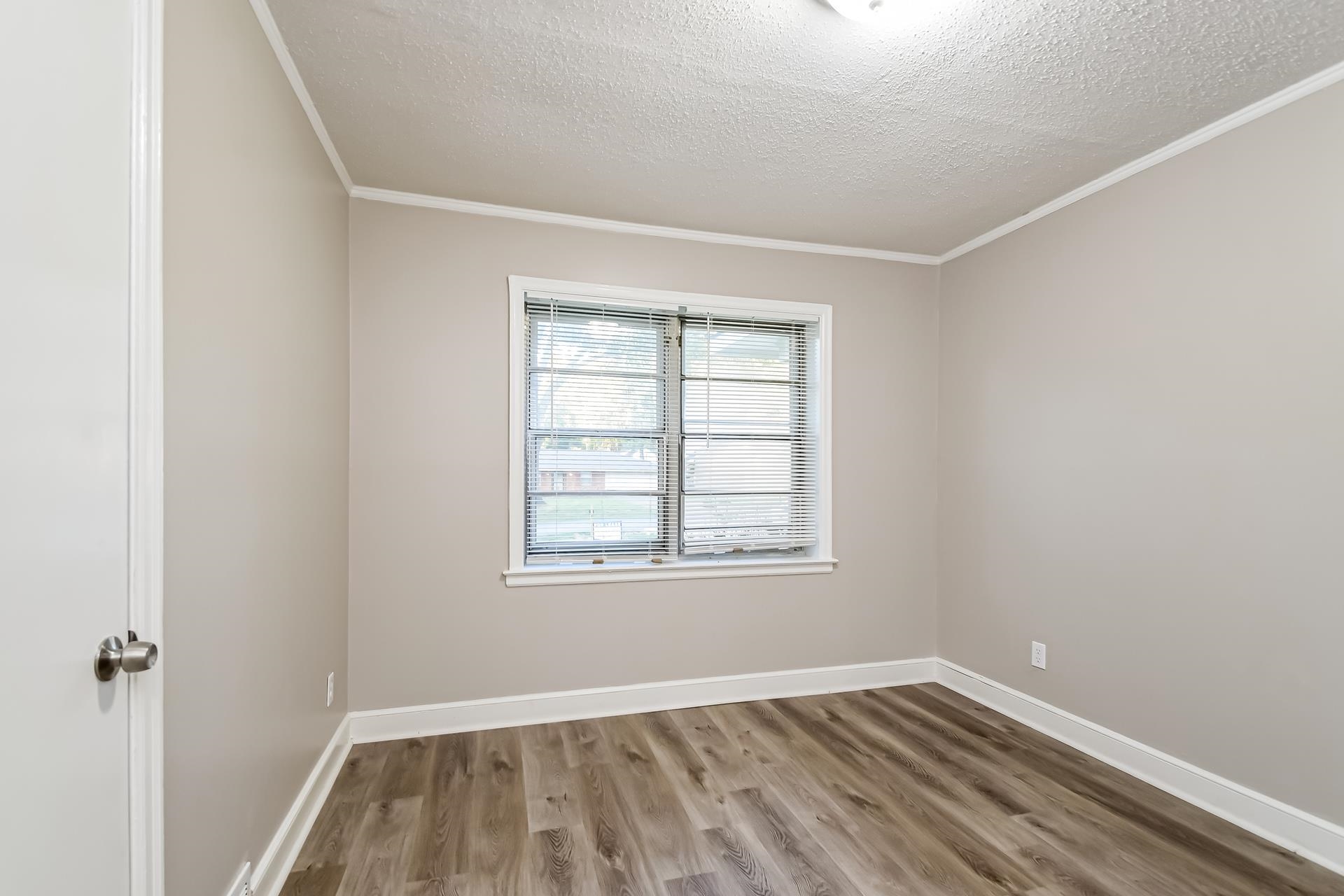5041 Davis Cove Memphis, TN 38116 - Photo 11 of 16 an empty room with a window