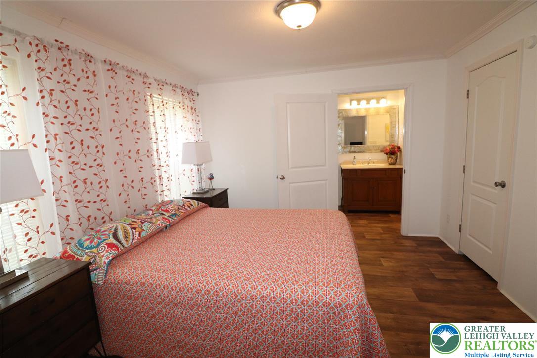 5005 Old Timber Road Stroudsburg, PA 18360 - Photo 22 of 44 a bedroom with a bed and a window