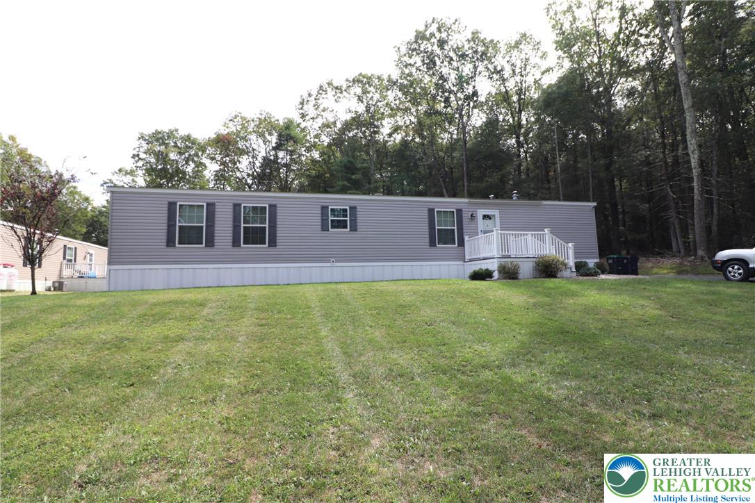 5005 Old Timber Road Stroudsburg, PA 18360 - Photo 29 of 44 a view of a house with a backyard