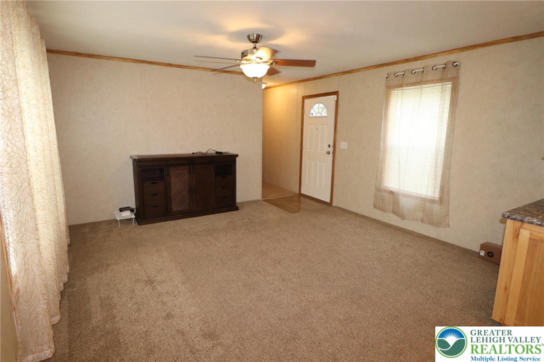 5005 Old Timber Road Stroudsburg, PA 18360 - Photo 5 of 44 a view of an empty room with a window