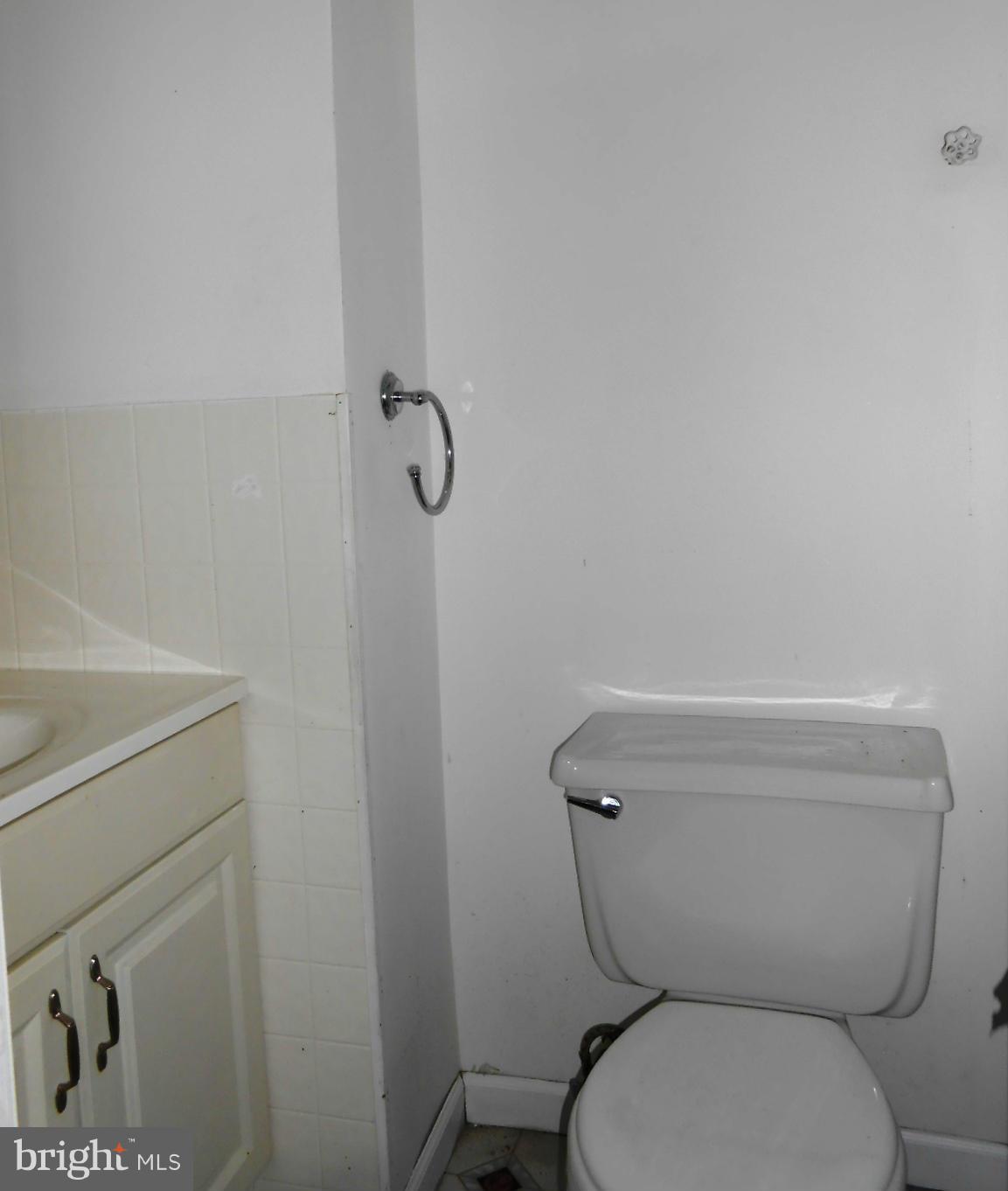 1207 Cedarcroft Road Baltimore, MD 21239 - Photo 7 of 13 Lower level 1/2 bath