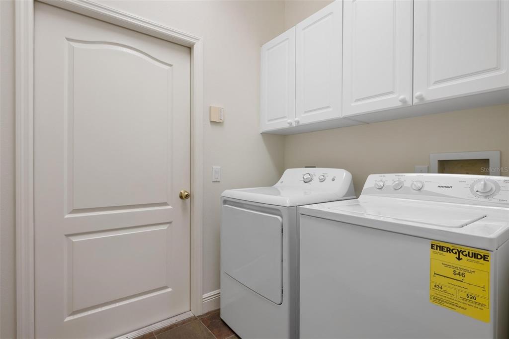 1807 San Trovaso Way Venice, FL 34285 - Photo 25 of 61 a utility room with dryer and washer