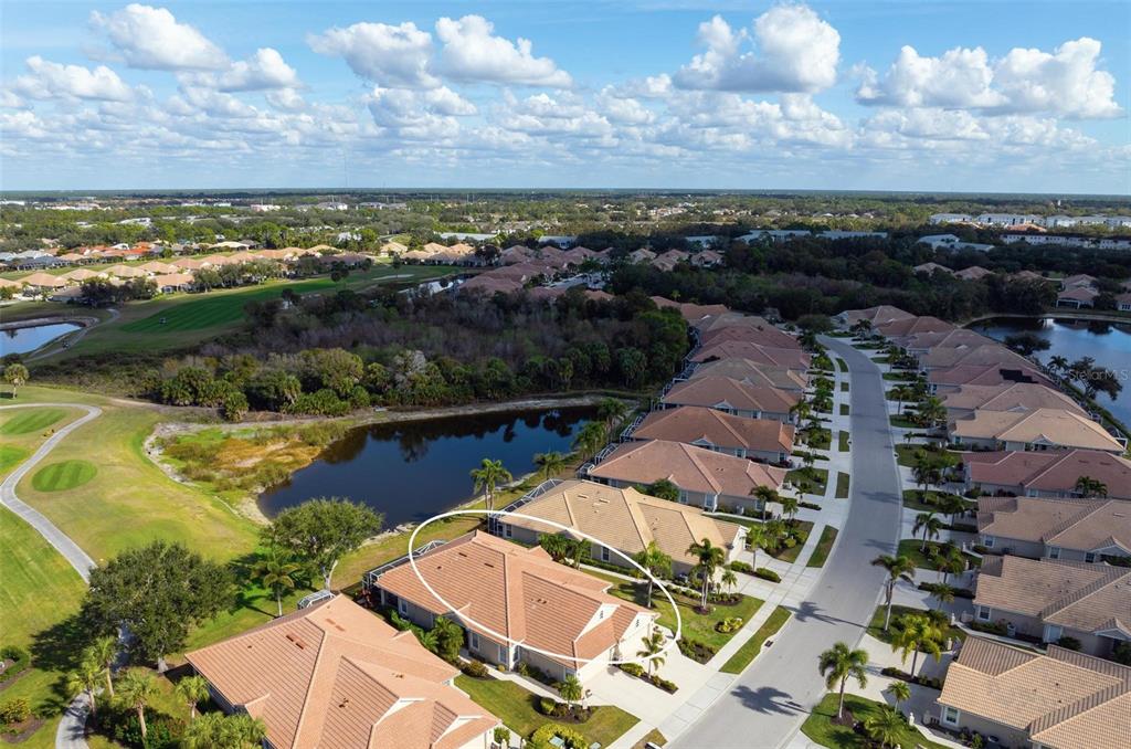 1807 San Trovaso Way Venice, FL 34285 - Photo 27 of 61 a view of a city with a lake
