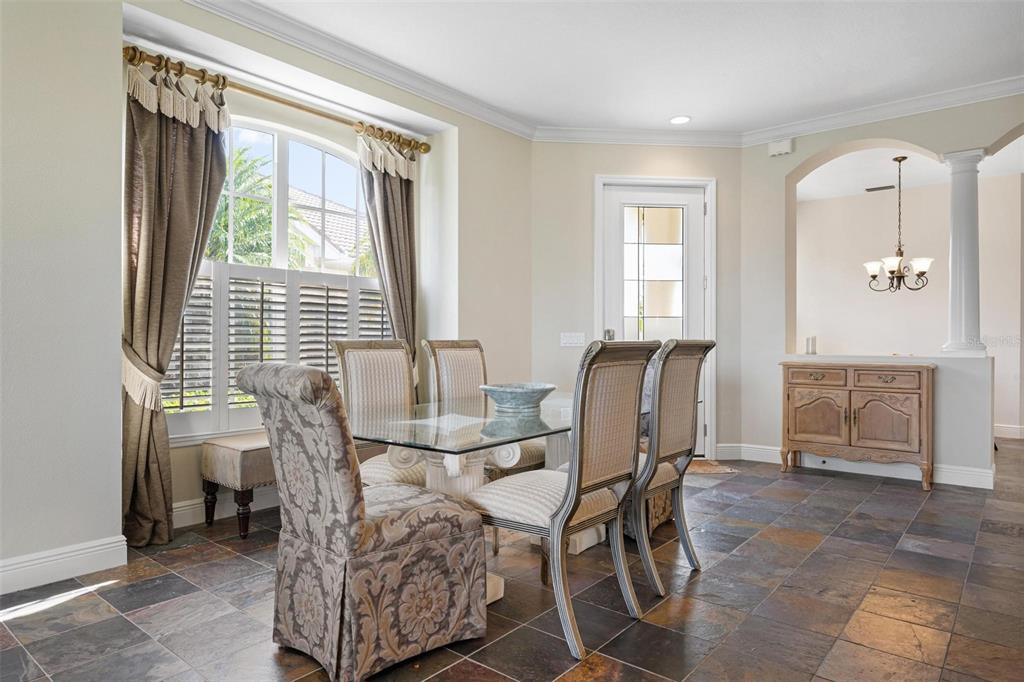 1807 San Trovaso Way Venice, FL 34285 - Photo 5 of 61 a view of a dining room with furniture and window