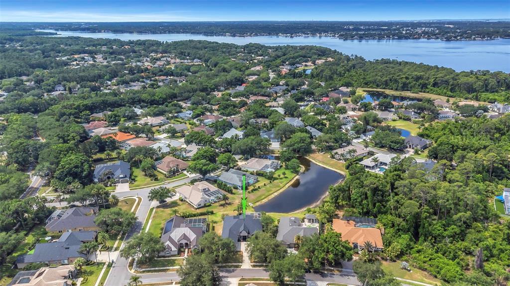 3716 Janus Way Palm Harbor, FL 34685 - Photo 59 of 69 an aerial view of a city with lots of residential buildings