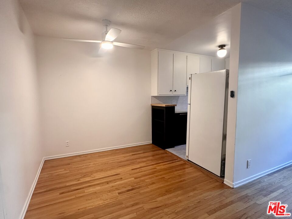 1420 17th Street, Unit 3 Santa Monica, CA 90404 - Photo 6 of 14 a view of kitchen with wooden floor