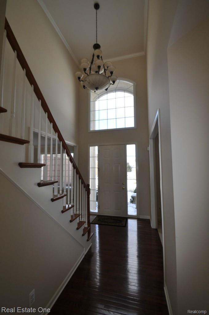 1094 Moran Drive Rochester, MI 48307 - Photo 3 of 30 FOYER STAIRCASE, HARDWOOD FLOORING