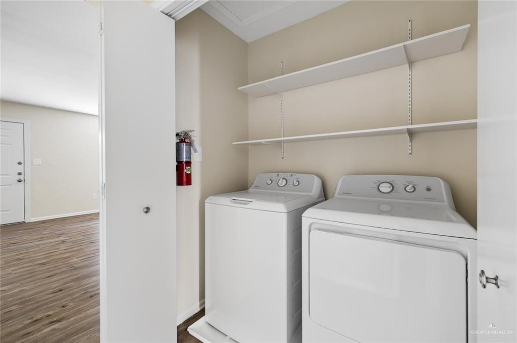 1105 West Stubbs Street, Unit 3 Edinburg, TX 78539 - Photo 11 of 15 a view of storage and utility room with washer and dryer
