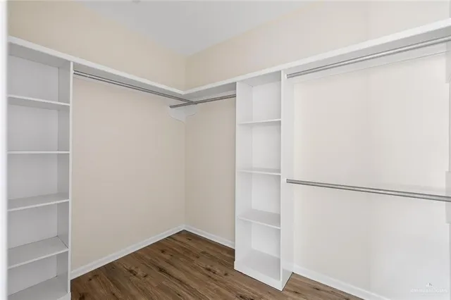 a view of storage and utility room with washer and dryer