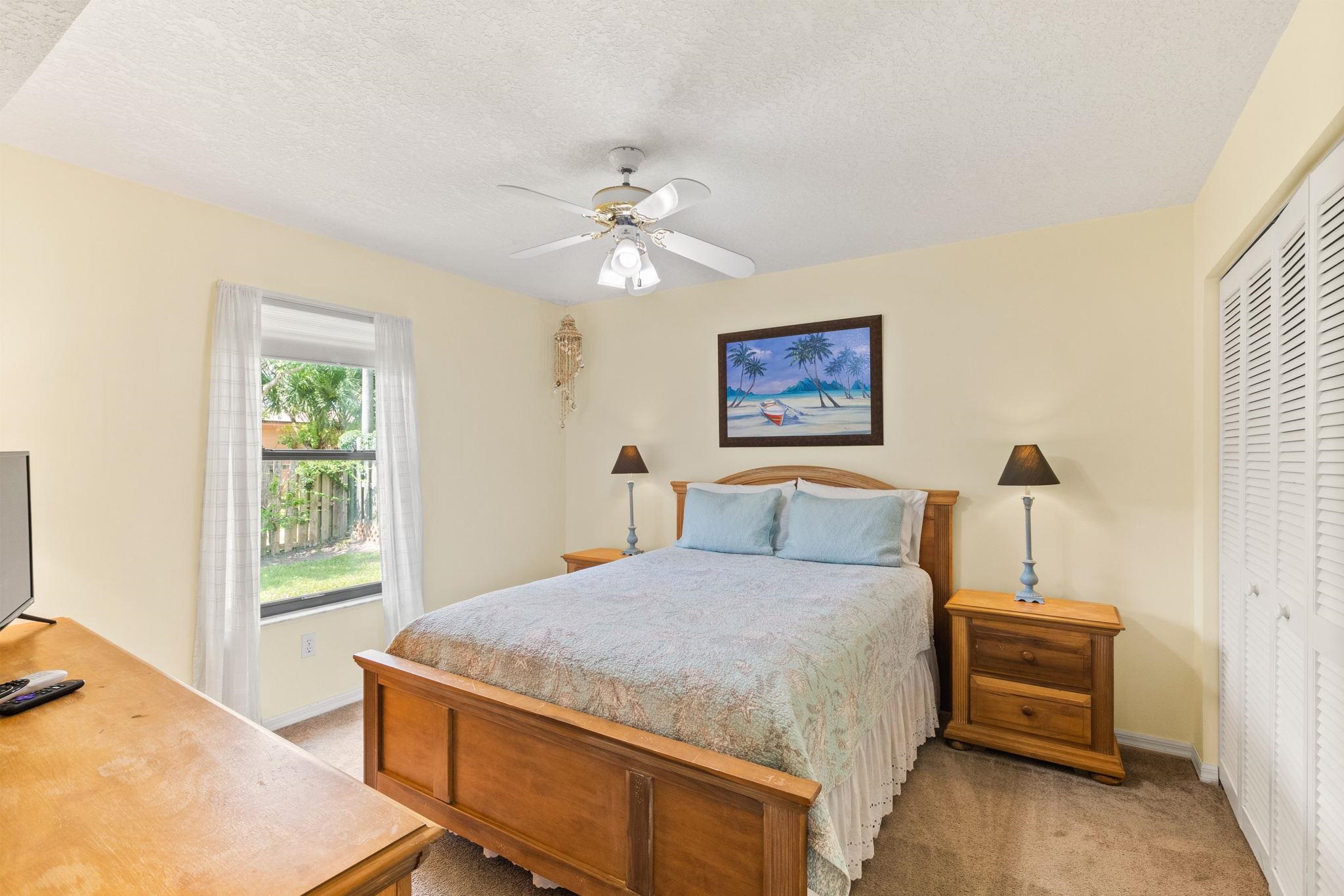 11 C Street St. Augustine, FL 32080 - Photo 17 of 40 a bedroom with a bed and a window