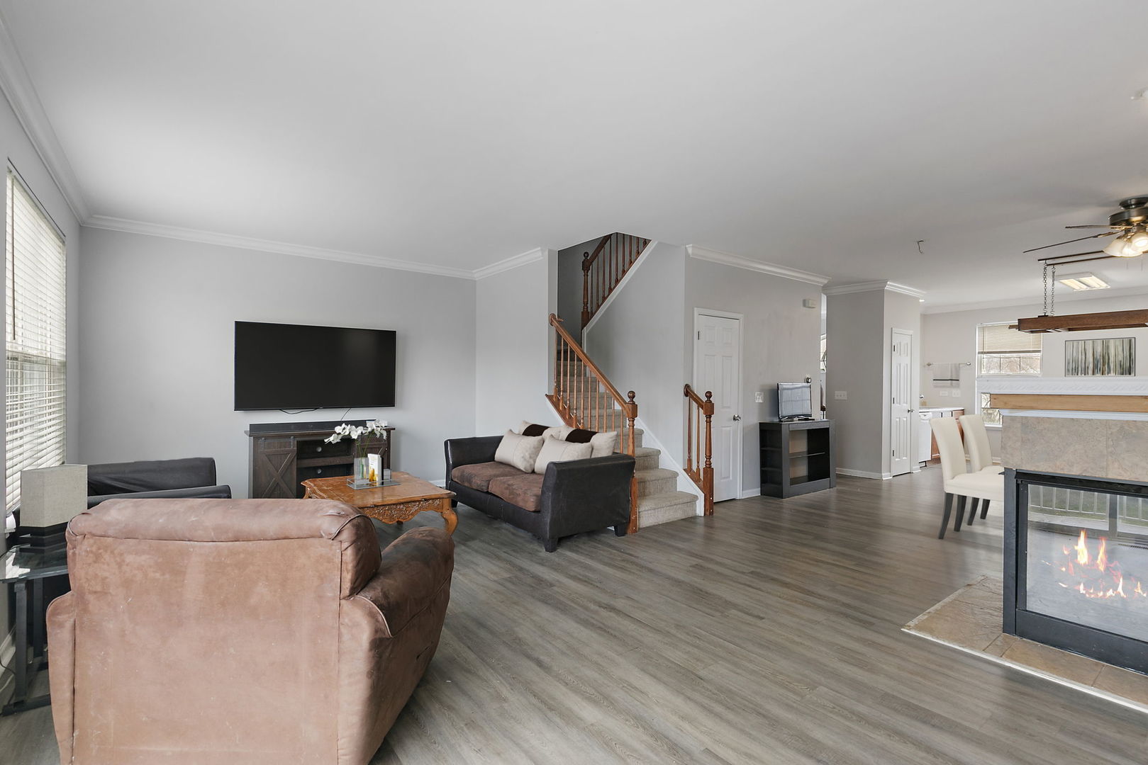 259 Comstock Drive Elgin, IL 60124 - Photo 7 of 15 a living room with furniture and a flat screen tv