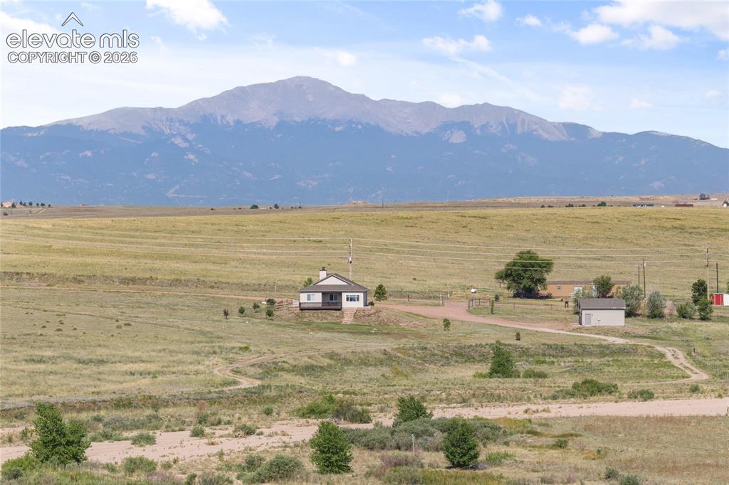 2105 Slocum Road Peyton, CO 80831 - Photo 26 of 31 a view of an ocean and a mountain