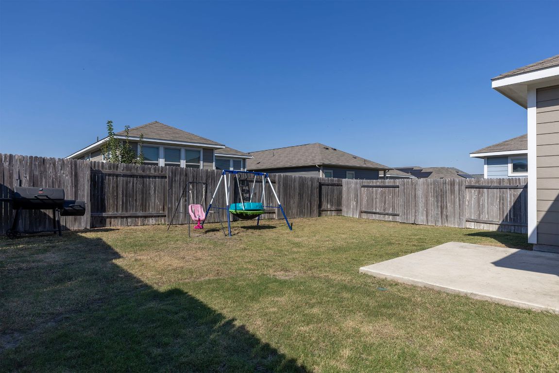 241 El Dorado Road Jarrell, TX 76537 - Photo 23 of 26 a view of a house with a yard and sitting area