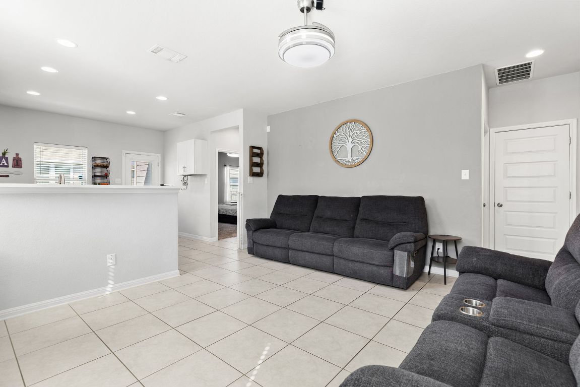 241 El Dorado Road Jarrell, TX 76537 - Photo 5 of 26 a living room with furniture and a table