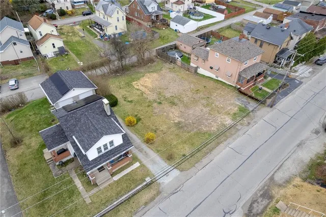 an aerial view of a highlighted house