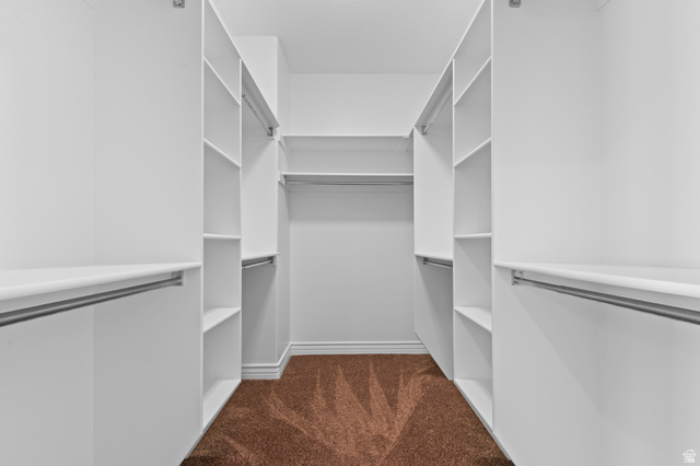 1501 West Elk Circle Mapleton, UT 84664 - Photo 26 of 39 Custom closet system featuring white shelving and chrome hanging rods