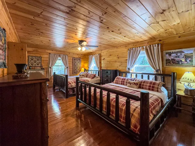 a bathroom with a granite countertop toilet sink and shower