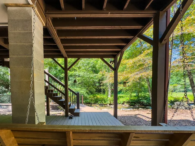 a view of a backyard of the house