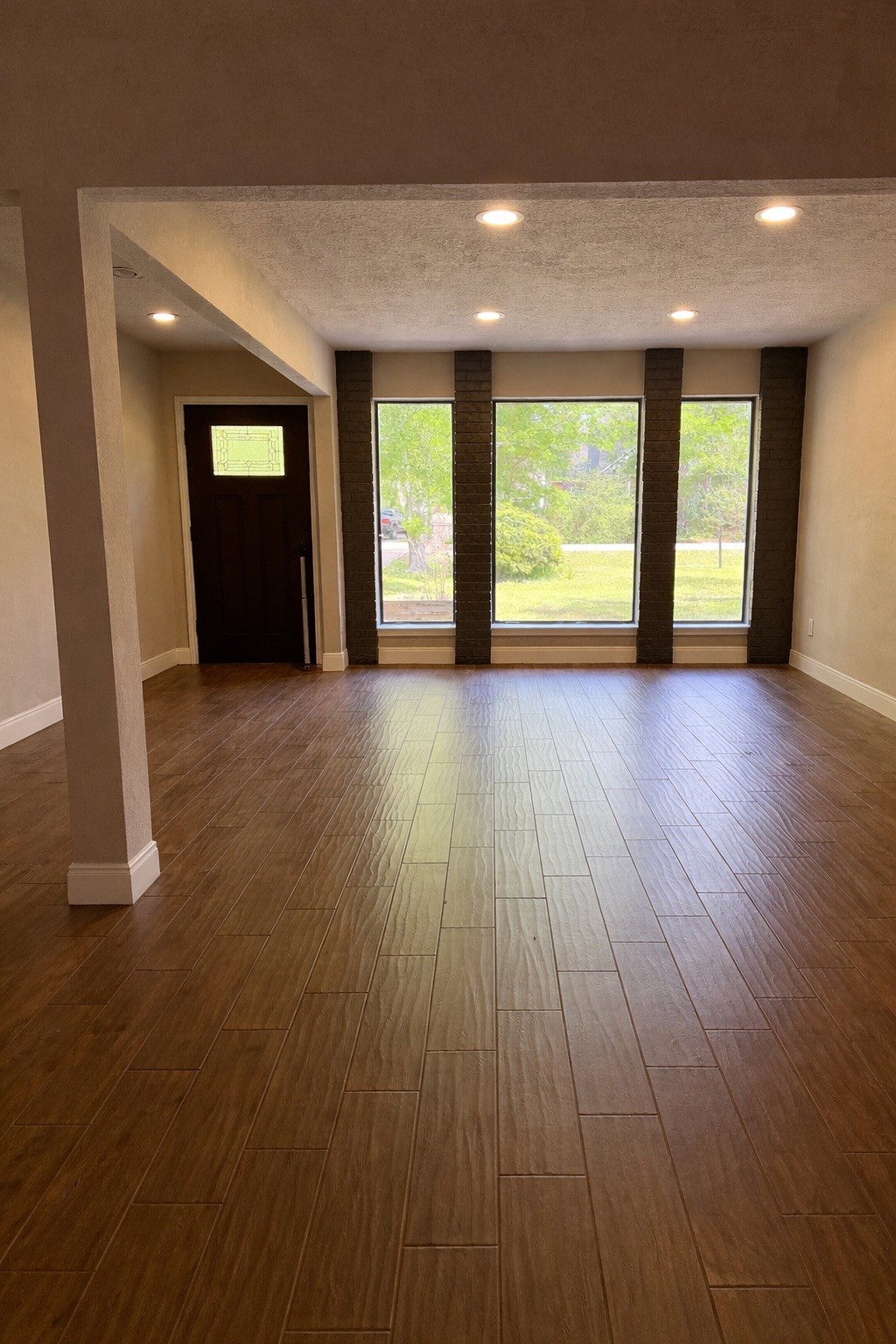19103 Whitewood Drive Spring, TX 77373 - Photo 5 of 30 an empty room with wooden floor and windows