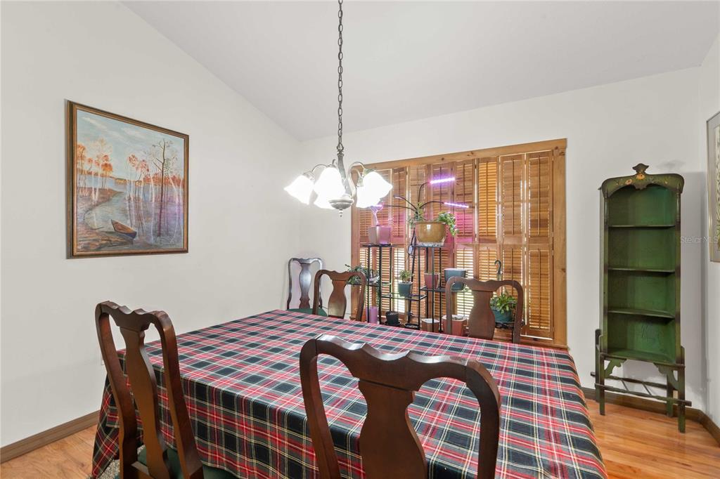 17055 Sweetwater Road Dade City, FL 33523 - Photo 29 of 53 a dining room with furniture and window