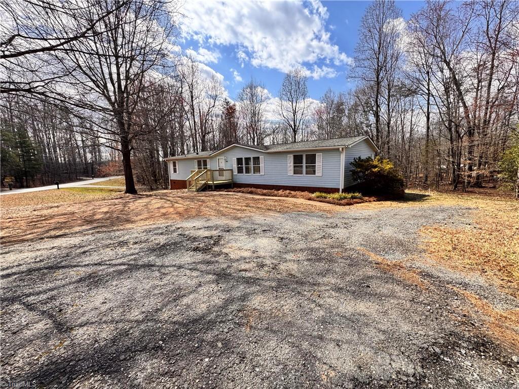 8405 Alda Road Stokesdale, NC 27357 - Photo 1 of 47 Circle driveway with extra parking