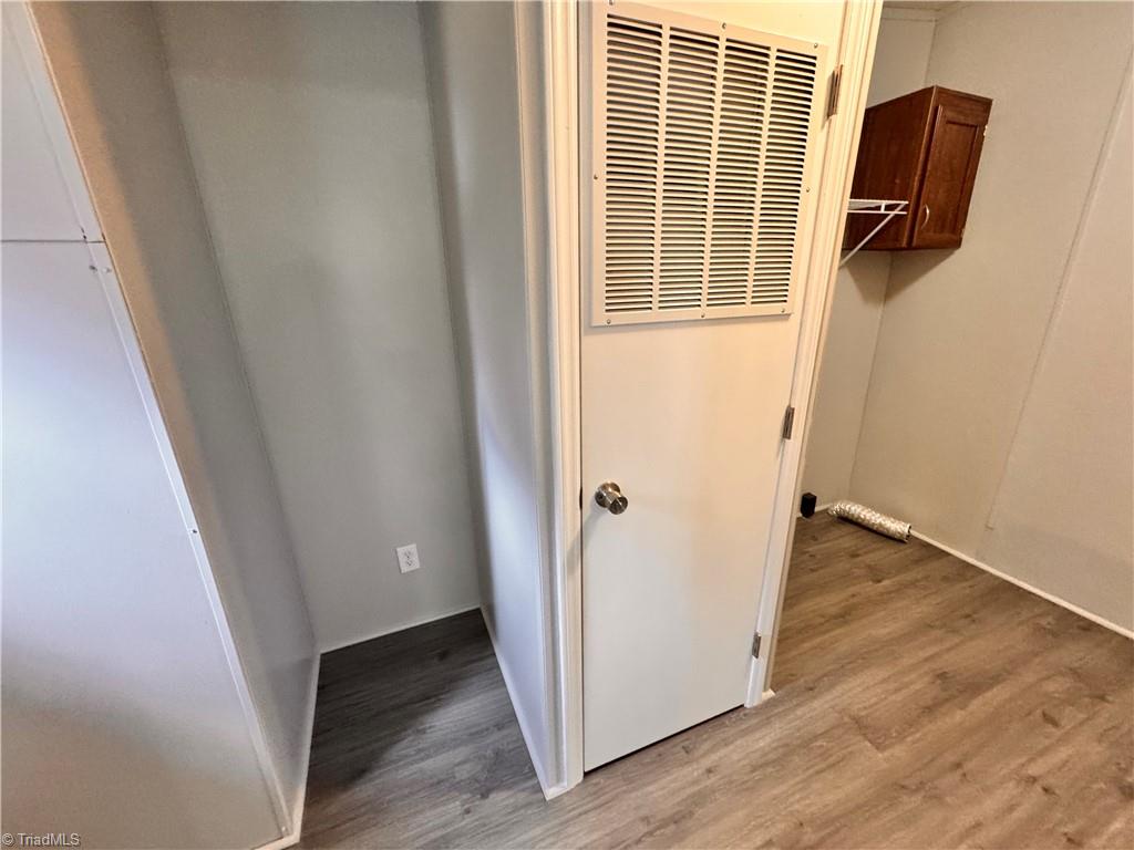 8405 Alda Road Stokesdale, NC 27357 - Photo 20 of 47 Laundry room has space for a small freezer