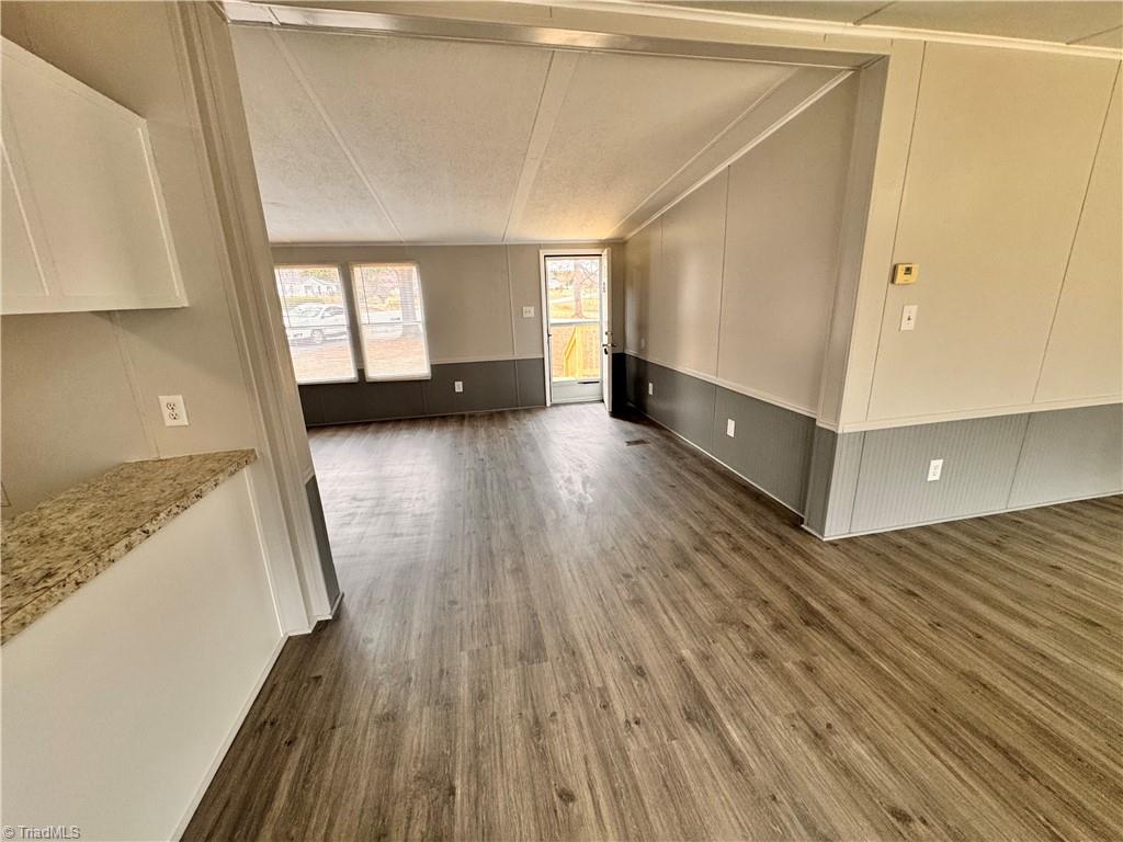 8405 Alda Road Stokesdale, NC 27357 - Photo 22 of 47 Another view of the dining room looking towards living room and front door