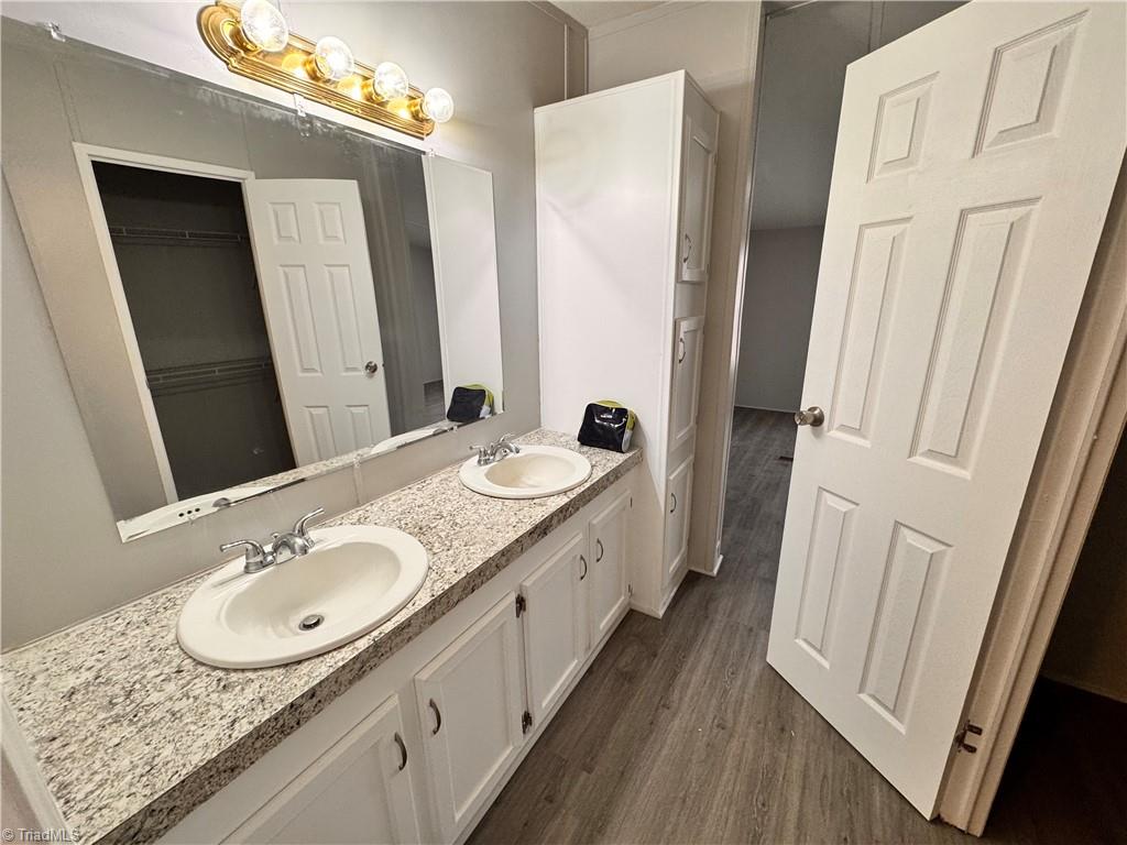 8405 Alda Road Stokesdale, NC 27357 - Photo 31 of 47 Double sinks are porcelain with new countertops and all new 6 panel doors thru-out home