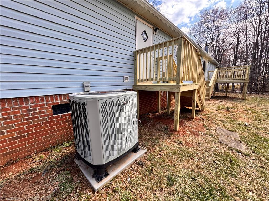 8405 Alda Road Stokesdale, NC 27357 - Photo 45 of 47 View of the TRANE heat pump and 3rd back porch
