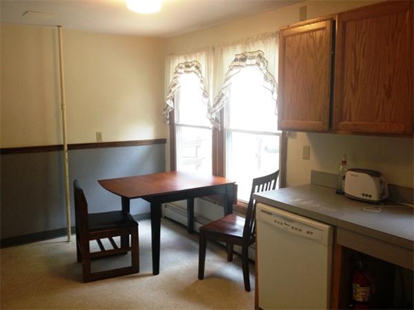 250 Plumtree Road Sunderland, MA 01375 - Photo 5 of 9 a kitchen with a table chairs and a window