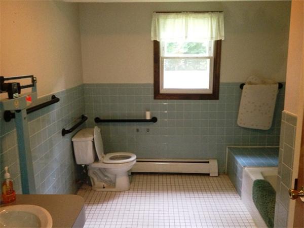 250 Plumtree Road Sunderland, MA 01375 - Photo 9 of 9 a bathroom with a toilet a sink and a window