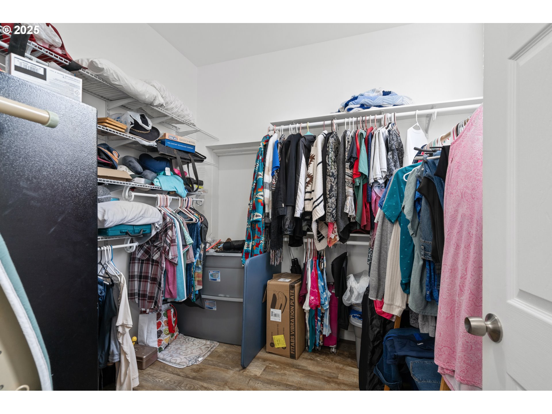 402 East Main Street Weston, OR 97886 - Photo 23 of 36 a view of walk in closet with clothes