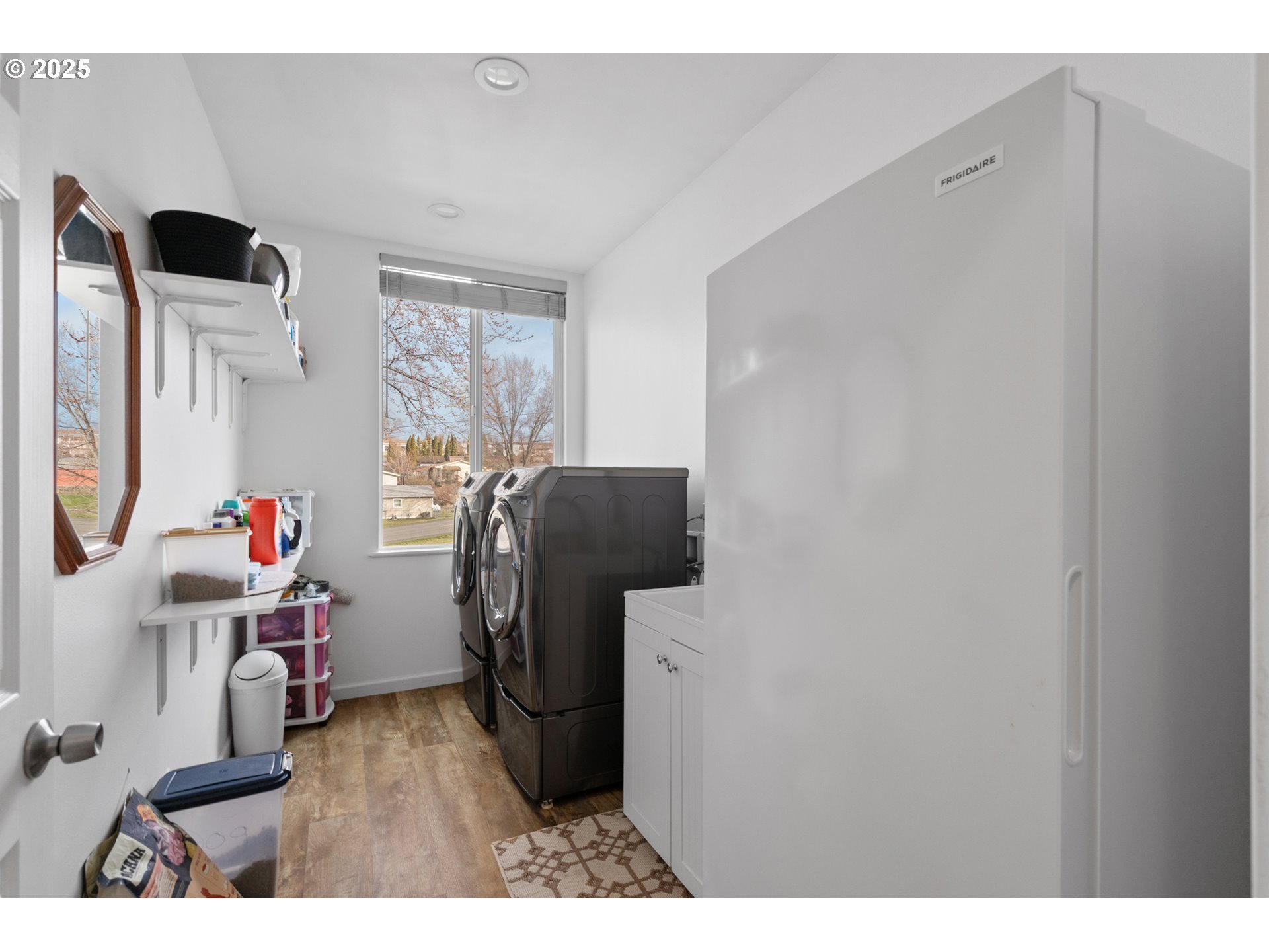 402 East Main Street Weston, OR 97886 - Photo 25 of 36 a utility room with wooden floor washer and dryer