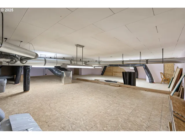 a living room with lots of furniture and appliances