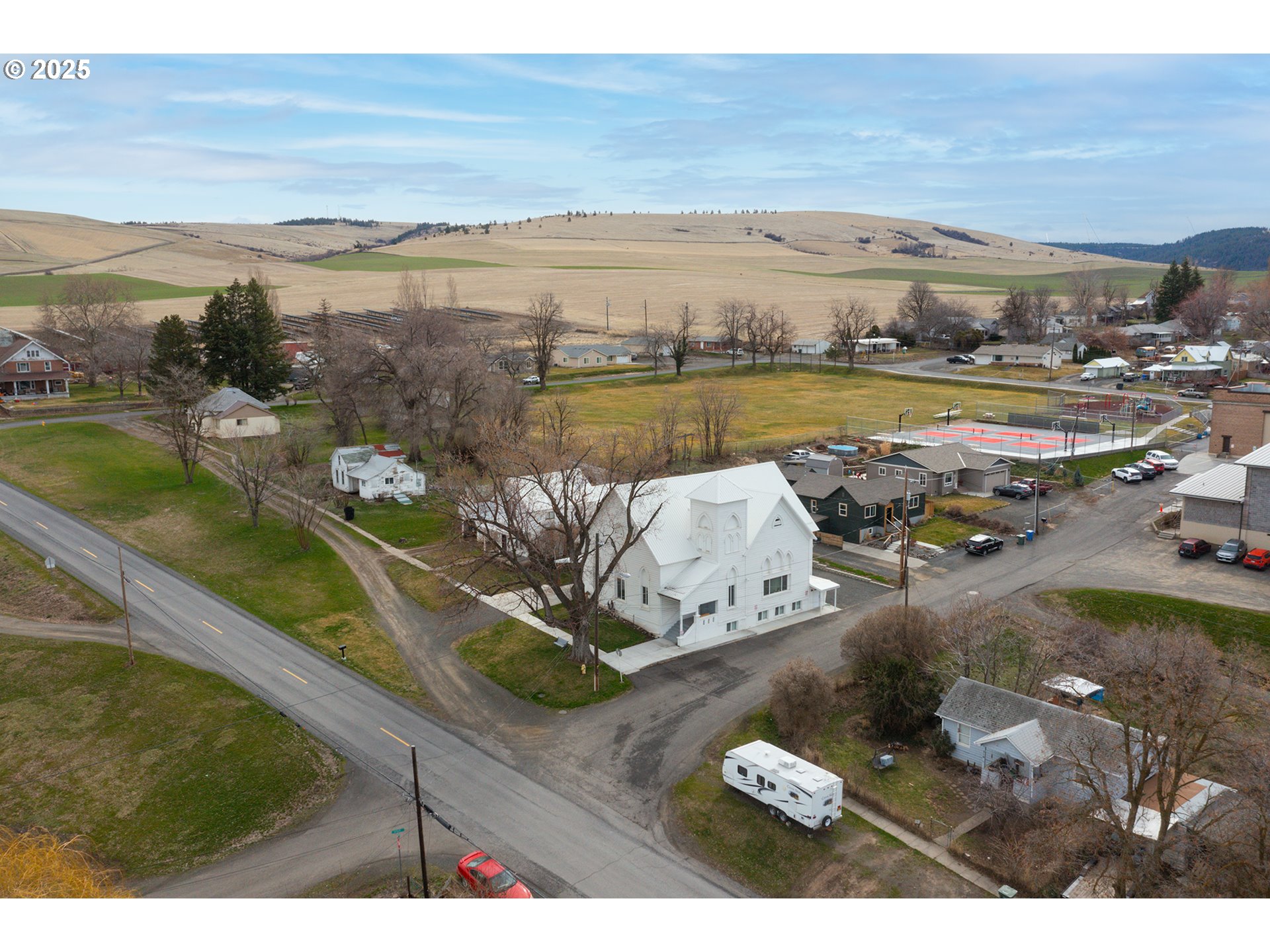 402 East Main Street Weston, OR 97886 - Photo 7 of 36 a view of a lake with a mountain